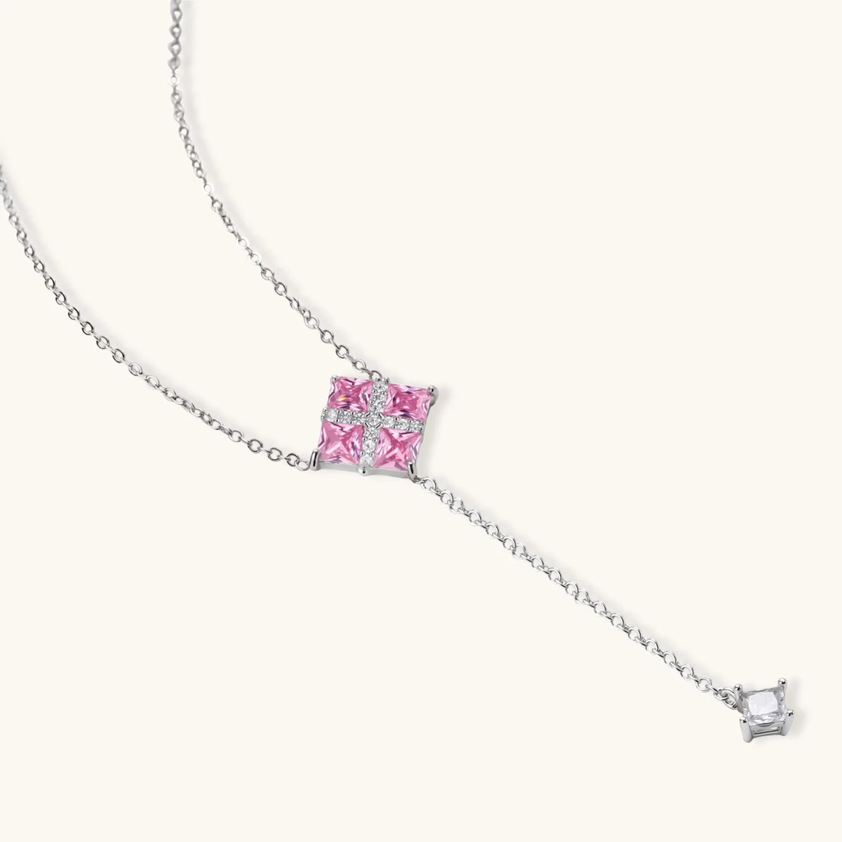 Pink Ribbon Cross Y-necklace on its own, with four pink stones under a white crossed band