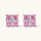 Close-up of the Pink Ribbon Cross square stud earrings with pink stones and a white crossed band