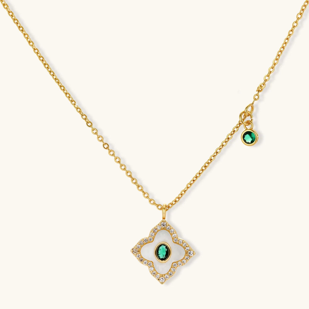 Emerald Bloom pendant necklace on its own, with a small round green charm on the chain