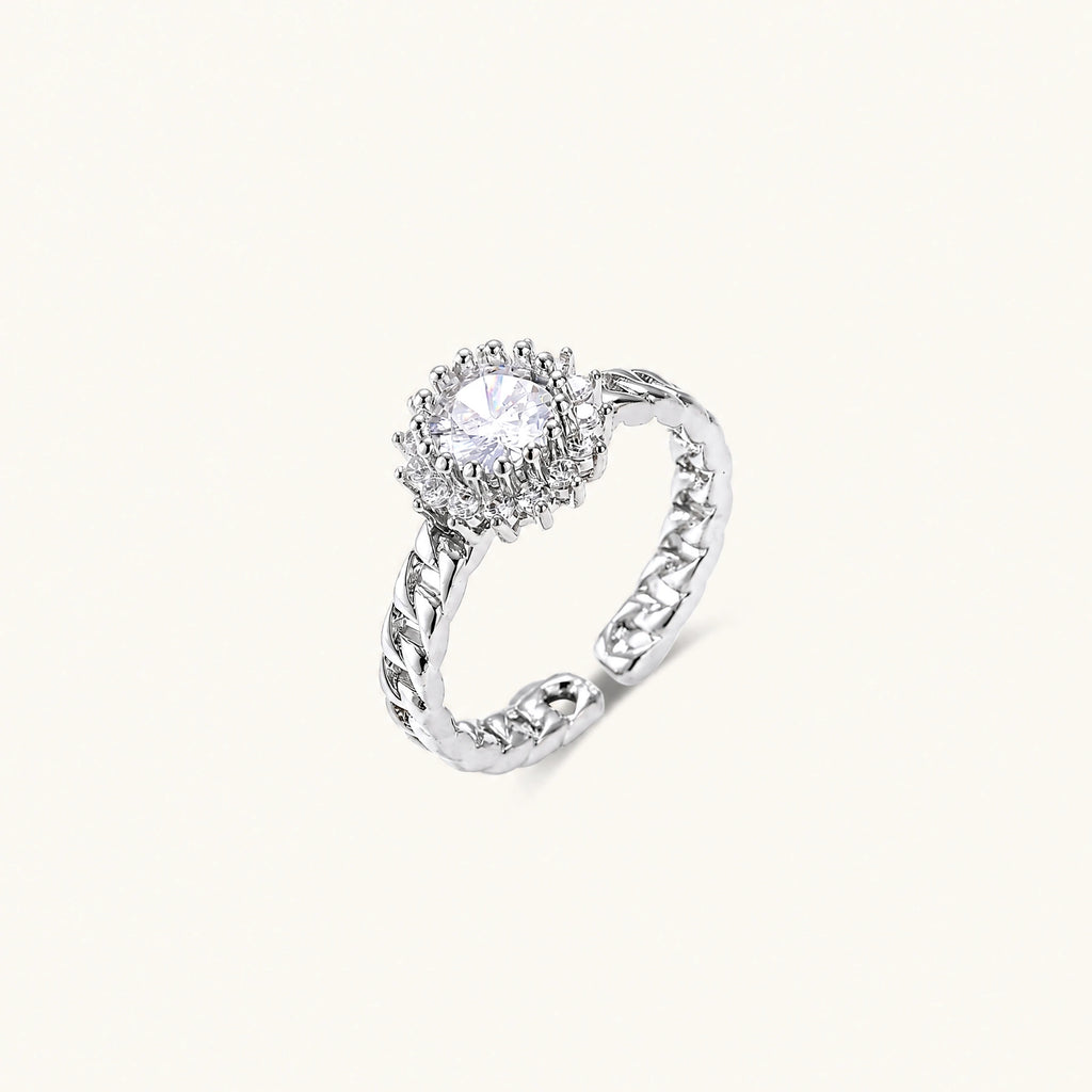 Two adjustable white gold plated rings with chain-link bands, featuring cubic zirconia halo and enamel details