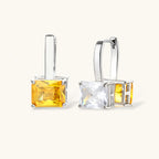 Solar Duo drop hoop earrings shown from two angles